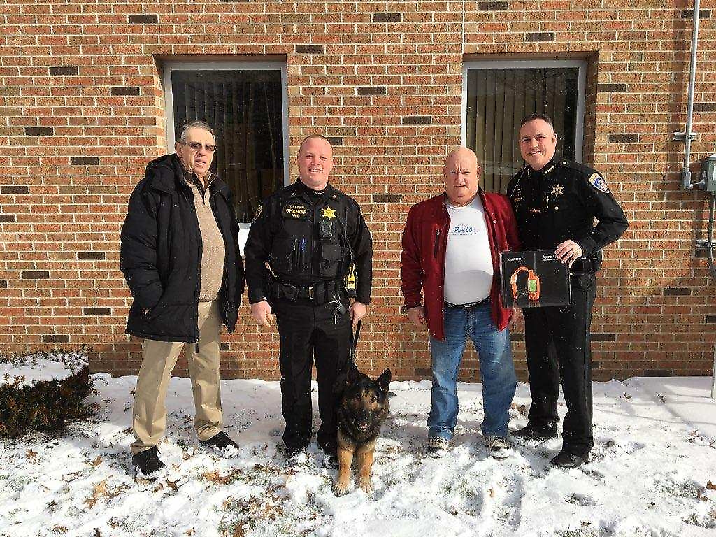 From left: Retired Trooper Bernie Pitass, Deputy Tim Pence, K9 Nichols, Donor Larry Speiser and Sheriff Tim Whitcomb