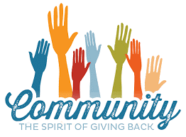 Forearms and hands reaching into the air with the text "Community The spirit of giving back"